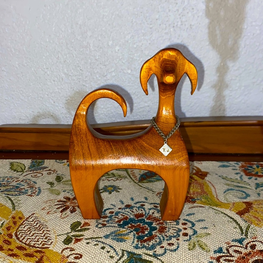 Vintage mid-century, modern carved solid wood dog with chain, engraved